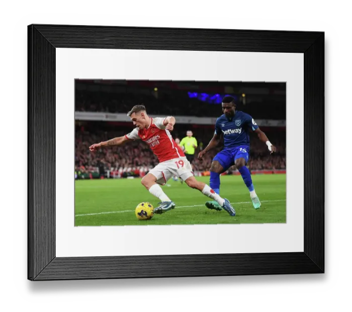 Framed Print : Arsenal vs. West Ham: Trossard Fends Off Kudus at Emirates Stadium (2023-24) Framed Print : Arsenal vs. West Ham: Trossard Fends Off Kudus at Emirates Stadium (2023-24)