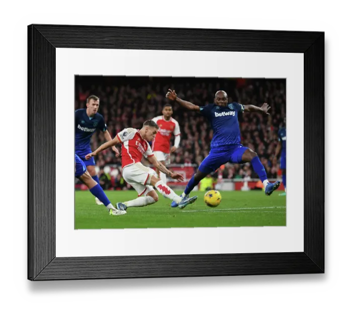Framed Print : Arsenal's Trossard Scores Under Pressure Against West Ham in 2023-24 Premier League Framed Print : Arsenal's Trossard Scores Under Pressure Against West Ham in 2023-24 Premier League