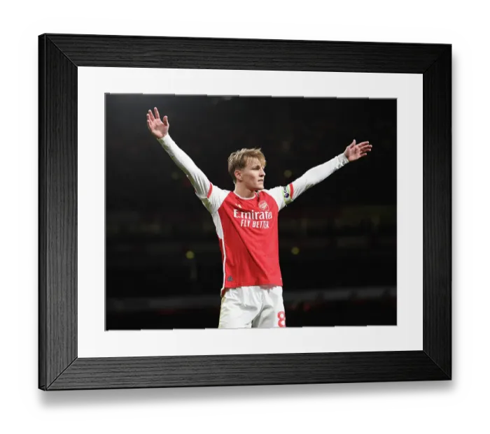 Framed Print : Arsenal's Martin Odegaard Shines in Premier League Clash Against West Ham United (2023-24)