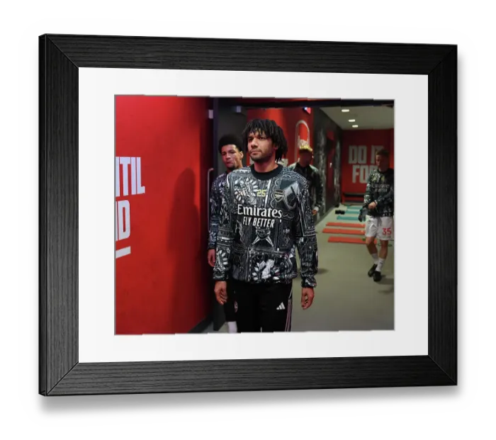 Framed Print : Arsenal's Mohamed Elneny Prepares for Arsenal v West Ham United Clash (2023-24) Framed Print : Arsenal's Mohamed Elneny Prepares for Arsenal v West Ham United Clash (2023-24)