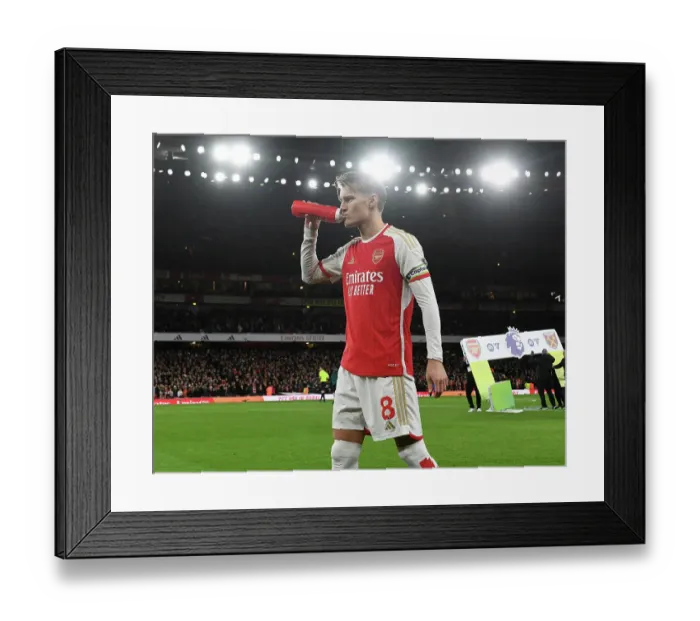 Framed Print : Arsenal's Martin Odegaard Gears Up for Arsenal v West Ham United Clash (2023-24)