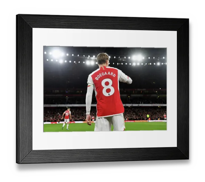 Framed Print : Martin Odegaard's Intense Concentration: Arsenal vs West Ham United (2023-24) Framed Print : Martin Odegaard's Intense Concentration: Arsenal vs West Ham United (2023-24)