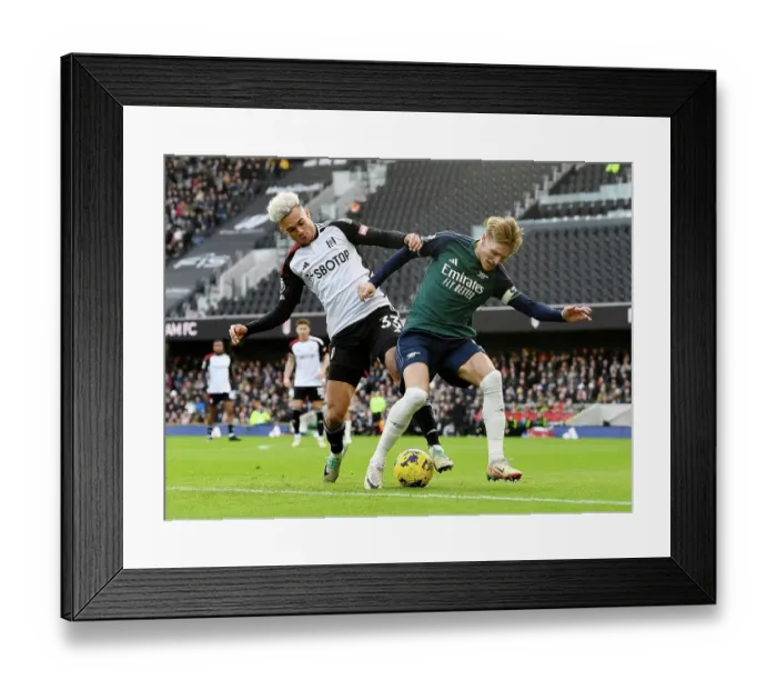 Framed Print : Fulham vs. Arsenal: Martin Odegaard Faces Off Against Antonee Robinson in Premier League Clash (December 2023)