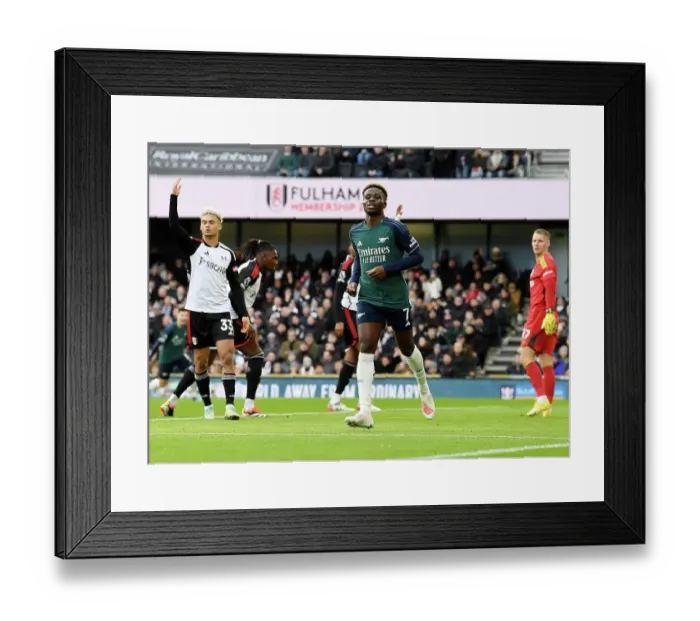 Framed Print : Saka Scores First: Arsenal's New Year's Victory over Fulham in the Premier League Framed Print : Saka Scores First: Arsenal's New Year's Victory over Fulham in the Premier League