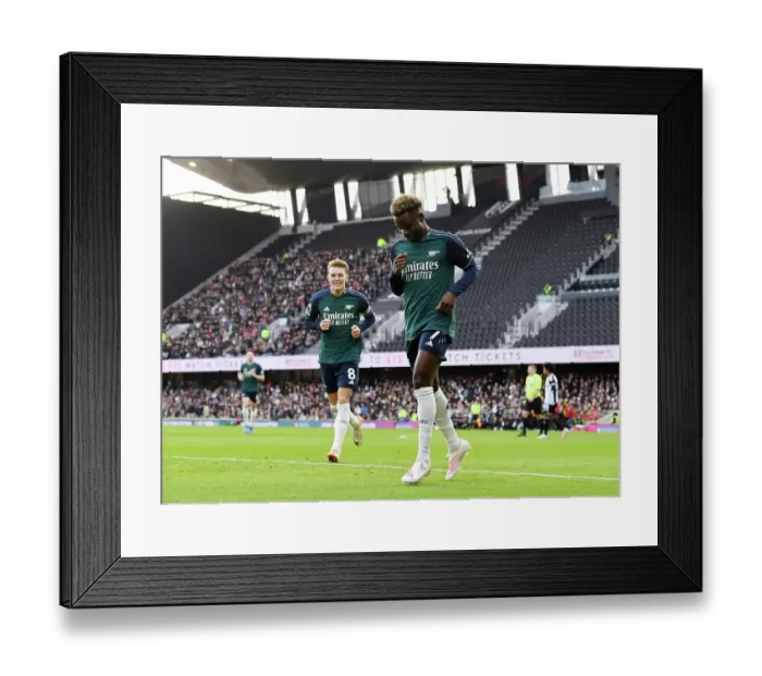 Framed Print : Saka Scores First: Arsenal's New Year Victory over Fulham in the Premier League Framed Print : Saka Scores First: Arsenal's New Year Victory over Fulham in the Premier League
