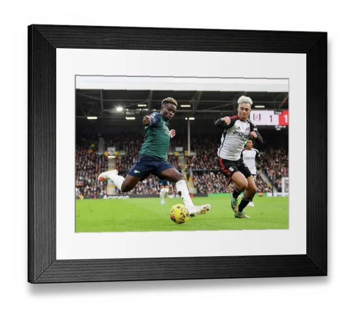 Framed Print : Bukayo Saka Tackled by Antonee Robinson: Fulham vs. Arsenal, Premier League 2023-24