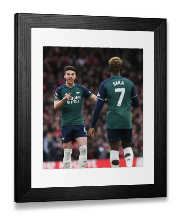 Framed Print : 2023-24 Premier League: Bukayo Saka and Declan Rice Share Strategies on the Field during Fulham vs. Arsenal