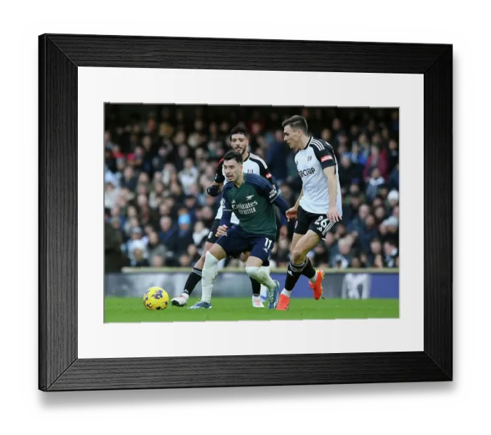 Framed Print : Fulham vs. Arsenal: Martinelli Fights for Possession in Intense Premier League Clash (2023-24)