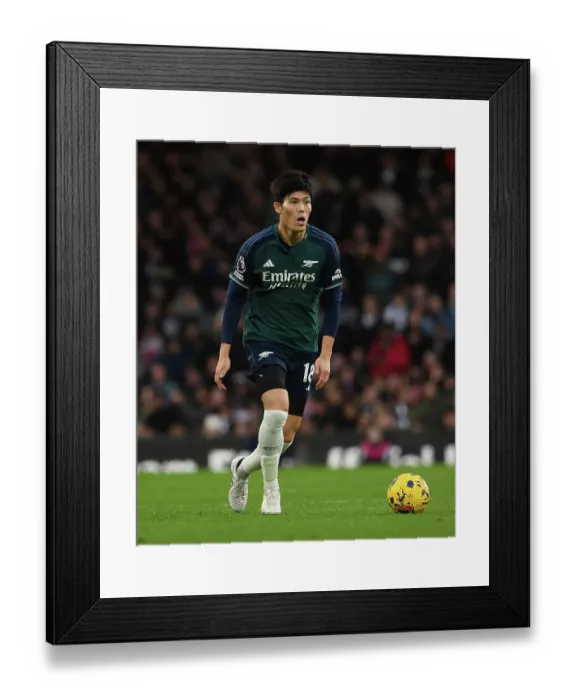 Framed Print : Arsenal's Tomiyasu in Action against Fulham in 2023-24 Premier League Clash