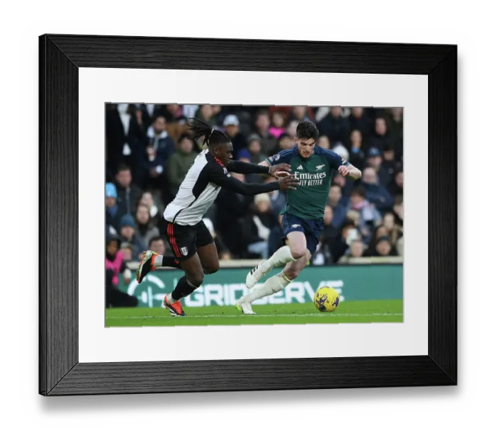 Framed Print : Arsenal's Declan Rice Fends Off Fulham's Calvin Bassey in Premier League Clash (Fulham v Arsenal 2023-24) Framed Print : Arsenal's Declan Rice Fends Off Fulham's Calvin Bassey in Premier League Clash (Fulham v Arsenal 2023-24)