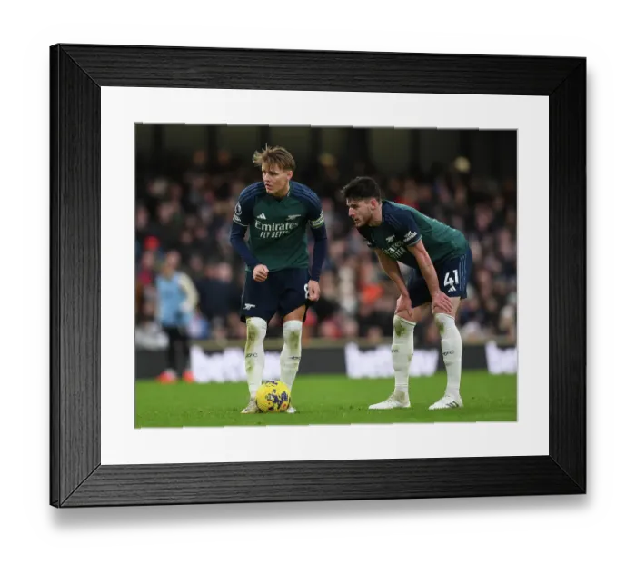 Framed Print : Arsenal's Martin Odegaard and Declan Rice Clash in Premier League Showdown: Fulham vs Arsenal (2023-24) Framed Print : Arsenal's Martin Odegaard and Declan Rice Clash in Premier League Showdown: Fulham vs Arsenal (2023-24)
