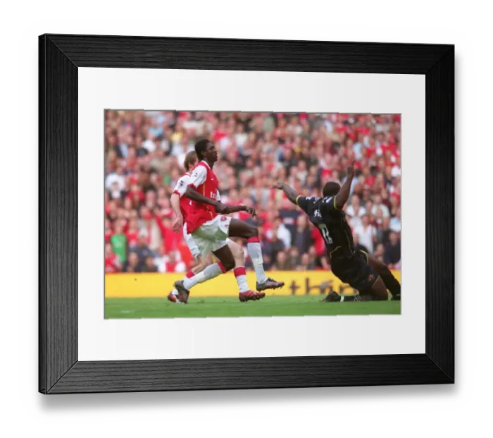 Framed Print : Adebayor's Thrilling Third: Arsenal's 3-0 Victory Over Watford