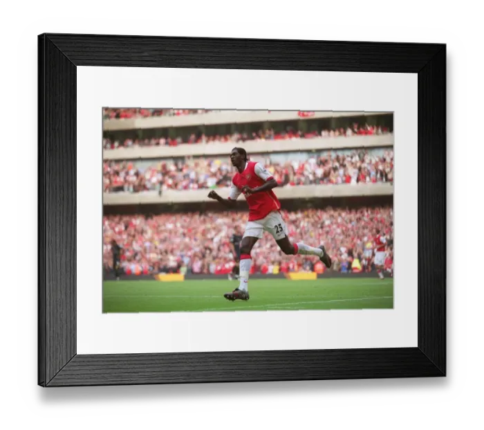 Framed Print : Adebayor's Triumph: Arsenal's 3-0 Victory Over Watford Framed Print : Adebayor's Triumph: Arsenal's 3-0 Victory Over Watford