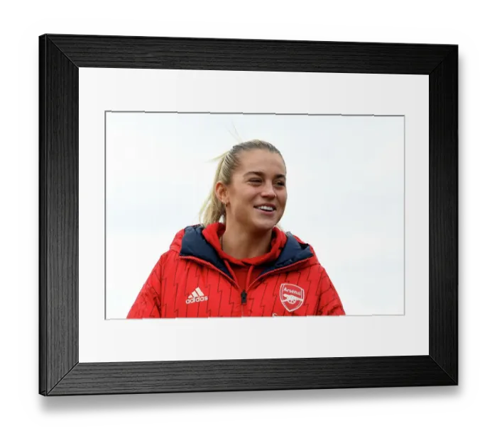 Framed Print : Alessia Russo Examining Pitch Before Arsenal Women vs. Watford Women FA Cup Match