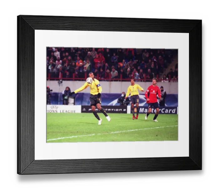 Framed Print : Thierry Henry shoots past CSKA Moscow goalkeeper Igor Akinfeev only to have his goal is rued out for handball. CSKA Moscow 1: 0 Arsenal, UEFA Champions League, Lokomotiv, Moscow, Russia, 17 / 10 / 2006. Credit: Stuart MacFarlane / Arsenal Framed Print : Thierry Henry shoots past CSKA Moscow goalkeeper Igor Akinfeev only to have his goal is rued out for handball. CSKA Moscow 1: 0 Arsenal, UEFA Champions League, Lokomotiv, Moscow, Russia, 17 / 10 / 2006. Credit: Stuart MacFarlane / Arsenal