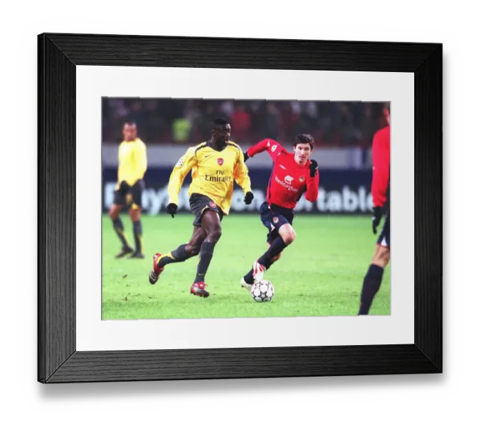 Framed Print : Clash of Titans: Kolo Toure vs. Evgeni Aldonin - Arsenal vs. CSKA Moscow, UEFA Champions League, 2006 Framed Print : Clash of Titans: Kolo Toure vs. Evgeni Aldonin - Arsenal vs. CSKA Moscow, UEFA Champions League, 2006