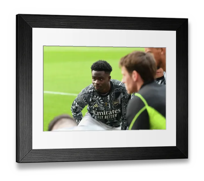 Framed Print : Bukayo Saka's Unwavering Focus: Arsenal FC's Pre-Match Preparation vs Crystal Palace (2023-24) Framed Print : Bukayo Saka's Unwavering Focus: Arsenal FC's Pre-Match Preparation vs Crystal Palace (2023-24)