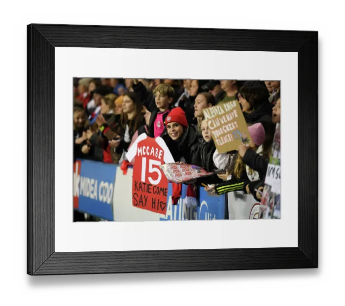 Framed Print : Young Arsenal Fans Celebrate with Katie McCabe after FA Women's Continental Tyres League Cup Match