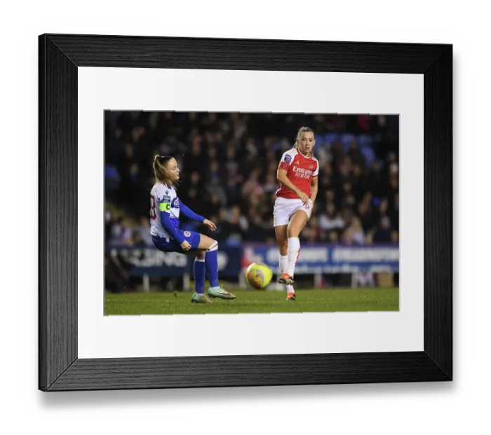 Framed Print : Arsenal's McCabe Goes Head-to-Head with Reading's Woodham in Conti Cup Showdown Framed Print : Arsenal's McCabe Goes Head-to-Head with Reading's Woodham in Conti Cup Showdown
