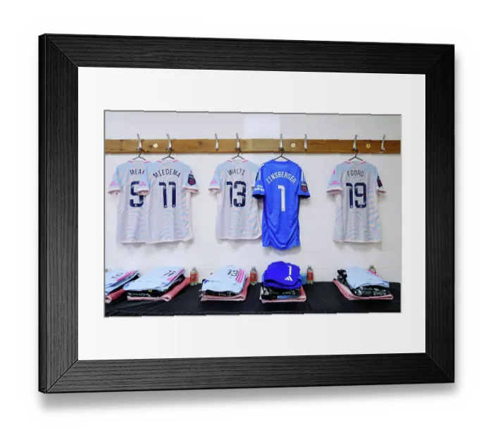 Framed Print : Arsenal and Liverpool Women's Super League: A Glimpse into Their Pre-Match Rituals: The Detailed Scene in the Dressing Room