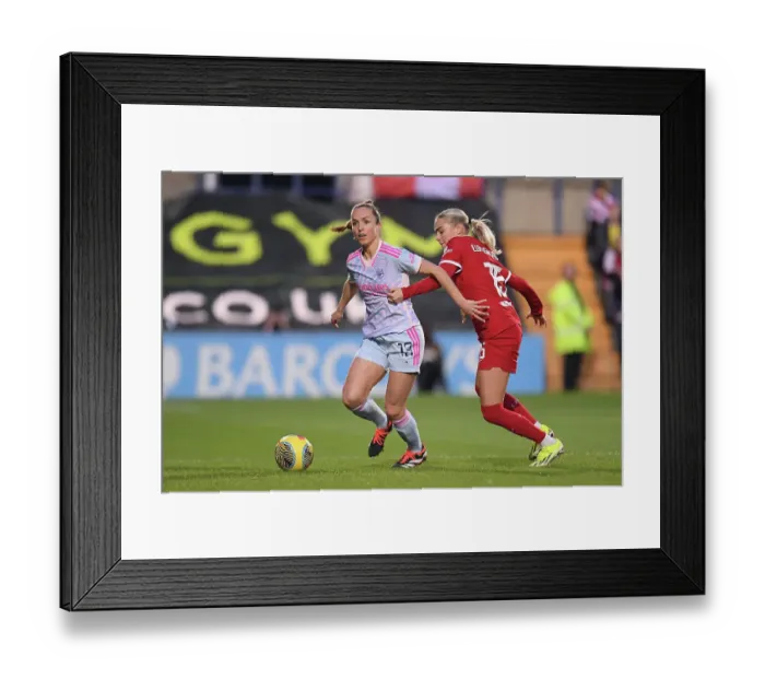 Framed Print : Lia Waelti vs. Sofie Lundgaard: Intense Battle in Liverpool FC vs. Arsenal FC Women's Super League Match