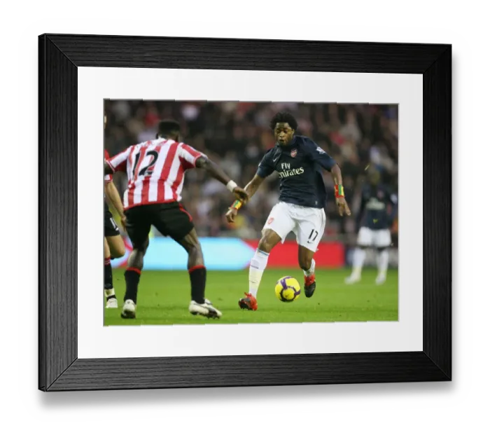 Framed Print : Alex Song (Arsenal) John Mensah (Sunderland). Sunderland 1: 0 Arsenal, Barclays Premier League Framed Print : Alex Song (Arsenal) John Mensah (Sunderland). Sunderland 1: 0 Arsenal, Barclays Premier League