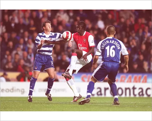 Emmanuel Adebayor (Arsenal) Nicky Shorey and Ivar Ingimarsson (Reading)