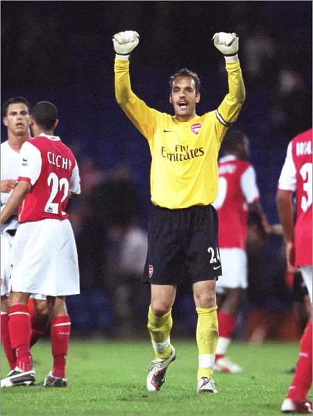 Manuel Almunia (Arsenal) celebrates in front of the Arsenal fans