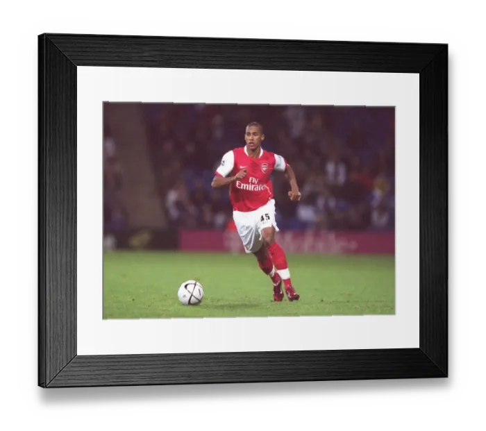 Framed Print : Armand Traore Leads Arsenal to 2-0 Victory over West Bromwich Albion in Carling League Cup