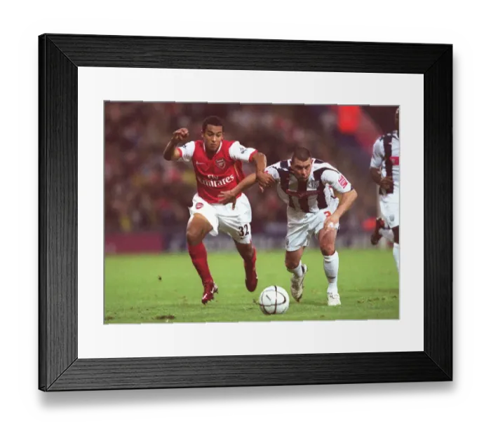 Framed Print : Theo Walcott's Brilliant Brace: Arsenal Cruise Past West Brom in Carling League Cup Framed Print : Theo Walcott's Brilliant Brace: Arsenal Cruise Past West Brom in Carling League Cup