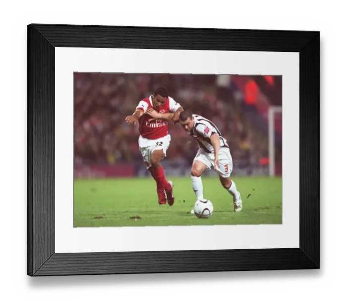 Framed Print : Theo Walcott's Brace: Arsenal Cruise Past West Brom in Carling League Cup