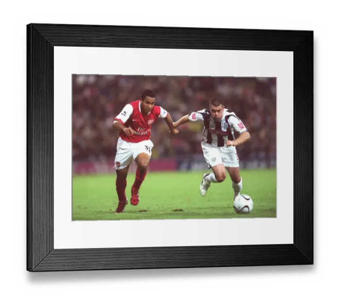 Framed Print : Theo Walcott's Brace: Arsenal Tops West Bromwich Albion 2-0 in Carling League Cup Framed Print : Theo Walcott's Brace: Arsenal Tops West Bromwich Albion 2-0 in Carling League Cup