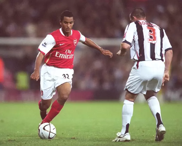Theo Walcott's Brace Leads Arsenal to 2-0 Victory over West Bromwich Albion in Carling League Cup