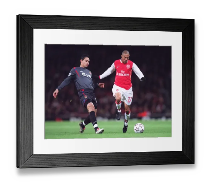 Framed Print : Gael Clichy (Arsenal) Dudu (CSKA) Framed Print : Gael Clichy (Arsenal) Dudu (CSKA)
