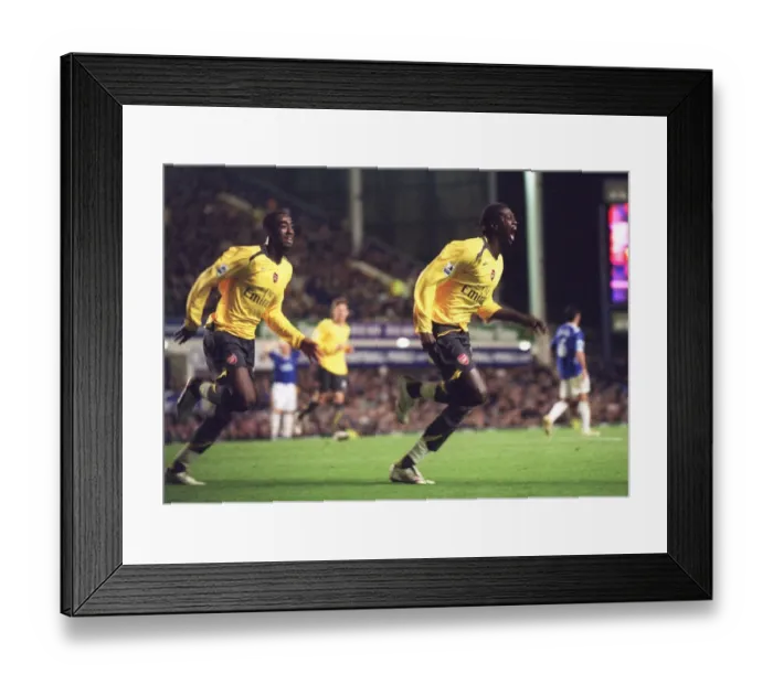 Framed Print : Adebayor and Djourou: Celebrating Arsenal's Carling Cup Victory