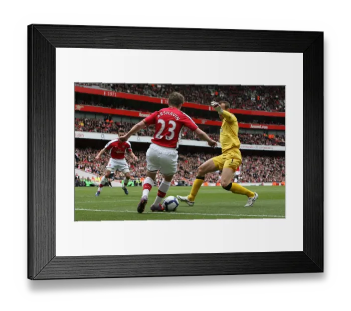 Framed Print : Andrey Arshavin (Arsenal) beats Mark Schwarzer (Fulham) on his way to scoring Arsenals 1st goal. Arsenal 4: 0 Fulham. Barclays Premier League. Emirates Stadium, 10  /  5  /  10. Credit : Arsenal Football Club  / 