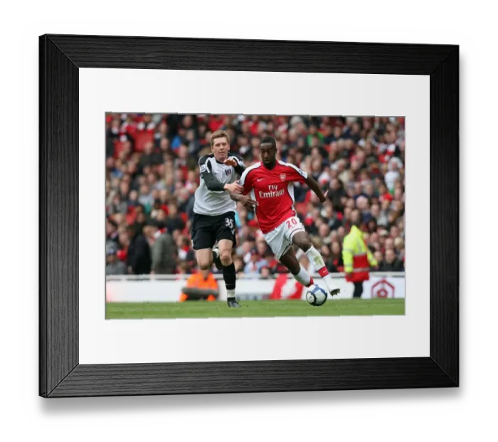 Framed Print : Arsenal's Johan Djourou Dominates David Elm in Arsenal's 4-0 Victory over Fulham, Barclays Premier League, Emirates Stadium, 10 / 5 / 10