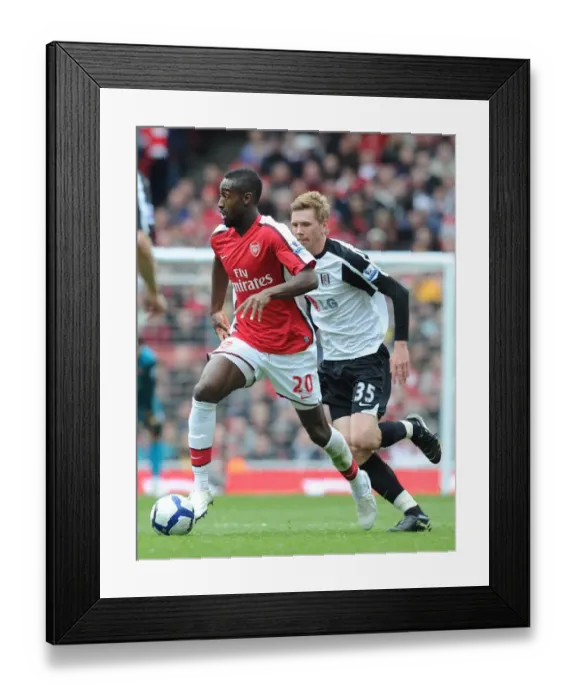 Framed Print : Johan Djourou (Arsenal) David Elm (Fulham). Arsenal 4: 0 Fulham, Barclays Premier League Framed Print : Johan Djourou (Arsenal) David Elm (Fulham). Arsenal 4: 0 Fulham, Barclays Premier League