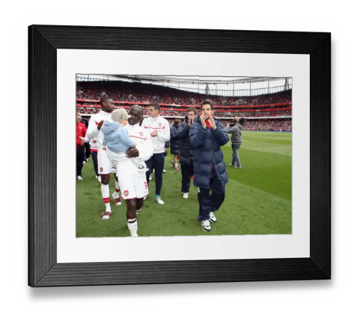 Framed Print : Bacary Sagna and Cesc Fabregas (Arsenal) clap the fans at the end of the match Framed Print : Bacary Sagna and Cesc Fabregas (Arsenal) clap the fans at the end of the match