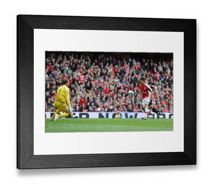 Framed Print : Carlos Vela chips the ball over Fulham goalkeeper Mark Schwarzer to score the 4th Arsenal goal Framed Print : Carlos Vela chips the ball over Fulham goalkeeper Mark Schwarzer to score the 4th Arsenal goal