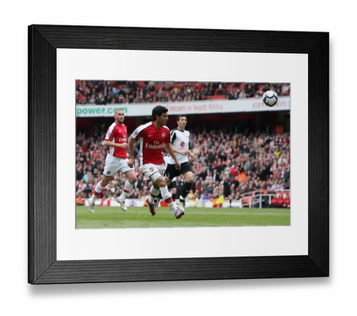 Framed Print : Carlos Vela scores Arsenals 4th goal. Arsenal 4: 0 Fulham. Barclays Premier League Framed Print : Carlos Vela scores Arsenals 4th goal. Arsenal 4: 0 Fulham. Barclays Premier League