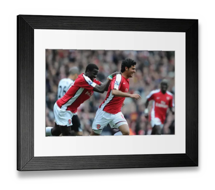 Framed Print : Carlos Vela celebrates scoring the 4th Arsenal goal with Emmanuel Eboue Framed Print : Carlos Vela celebrates scoring the 4th Arsenal goal with Emmanuel Eboue