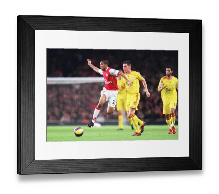 Framed Print : Clash of Titans: Arsenal's Clichy Shines as Gunners Triumph Over Finnan's Liverpool 3-0 in FA Premier League Framed Print : Clash of Titans: Arsenal's Clichy Shines as Gunners Triumph Over Finnan's Liverpool 3-0 in FA Premier League