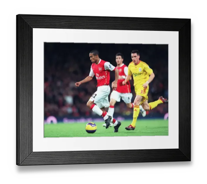 Framed Print : Clash of the Left Backs: Arsenal's Gael Clichy Shines in 3:0 Victory over Liverpool's Steve Finnan