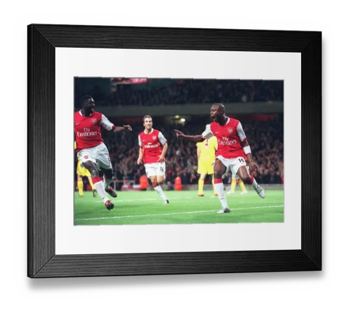 Framed Print : Triumphant Threesome: Gallas, Toure, and Flamini Celebrate Arsenal's 3-0 Victory Over Liverpool