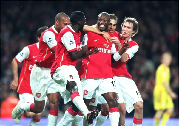 William Gallas celebrates scoring Arsenals 3rd goal with Thierry Henry
