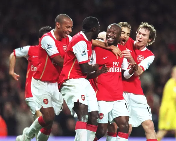 Arsenal Triumph: Gallas, Henry, and Team Celebrate 3-0 Over Liverpool