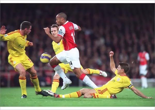 Thierry Henry (Arsenal) Jamie Carragher and Steven Gerrard (Liverpool)