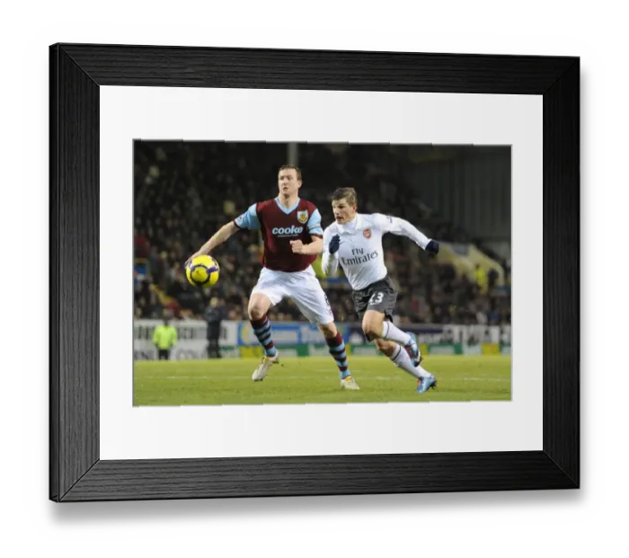 Framed Print : Andrey Arshavin (Arsenal) Steven Caldwell (Burnley). Burnley 1: 1 Arsenal