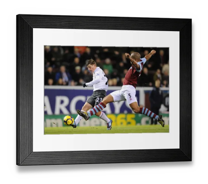 Framed Print : Andrey Arshavin (Arsenal) Clarke Carlisle (Burnley). Burnley 1: 1 Arsenal